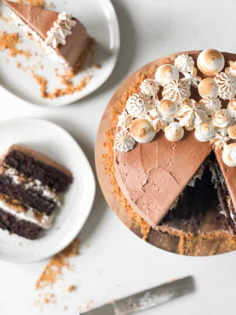 S'mores cake with layers of graham crackers and marshmallow.